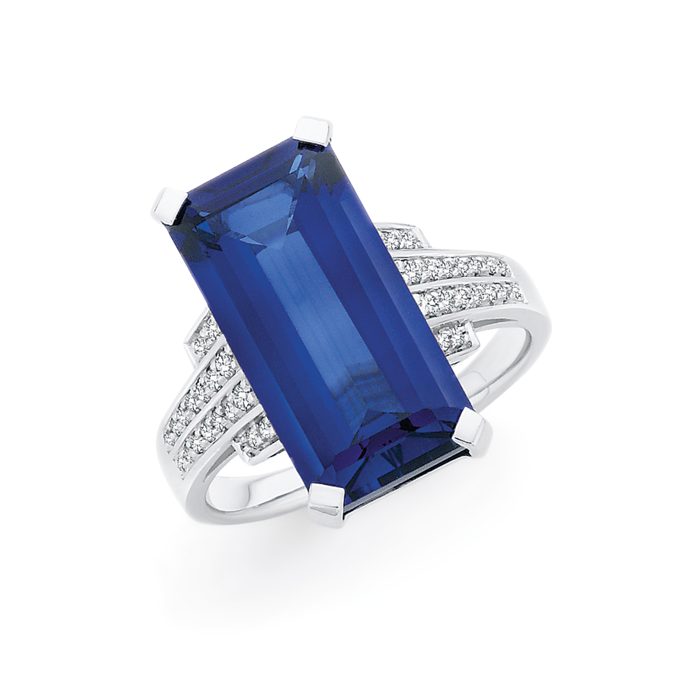 Oval Cut Blue Sapphire Ring w/ Baguette Diamonds 18K White Gold