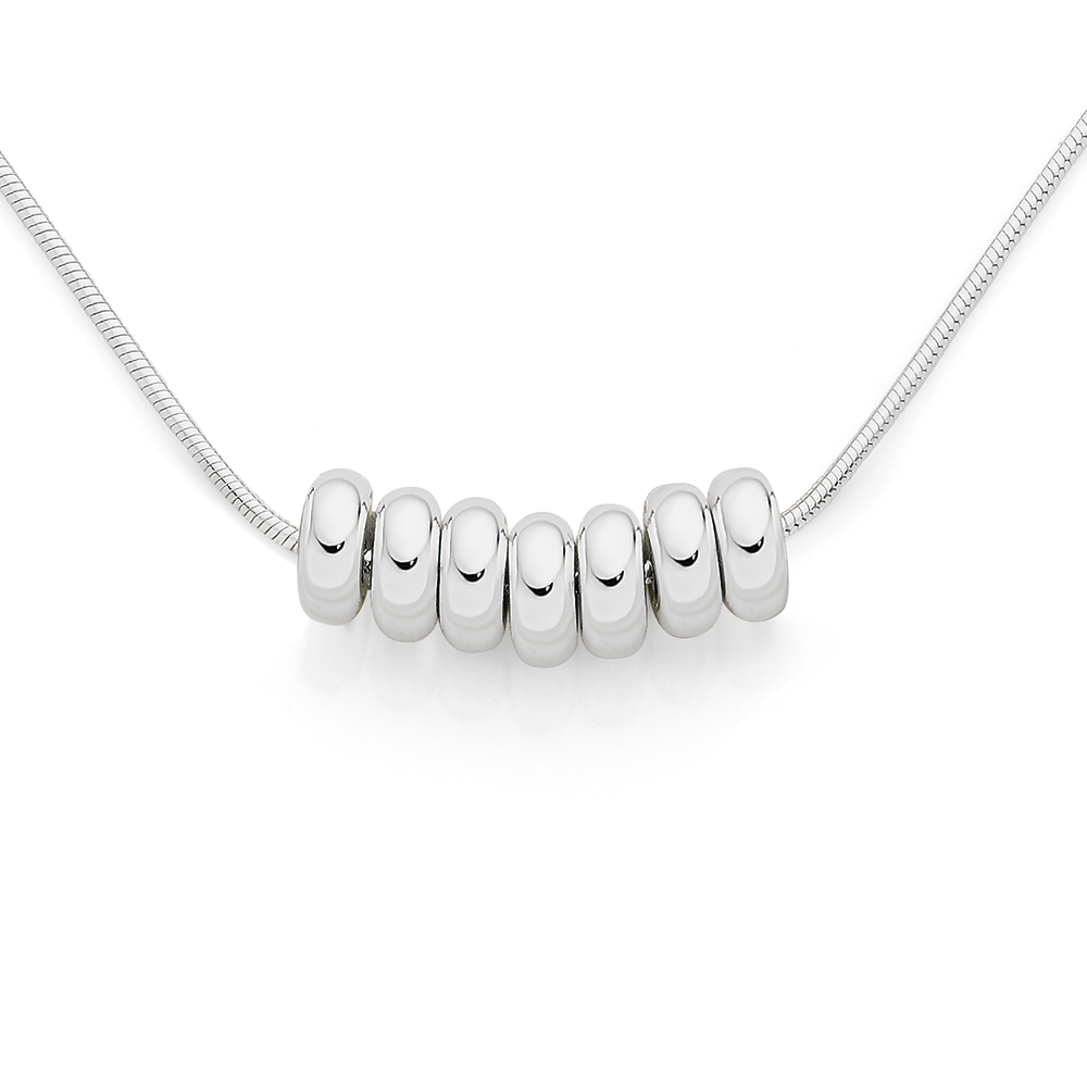 Ivory ring pendant on silver chain 616. India.